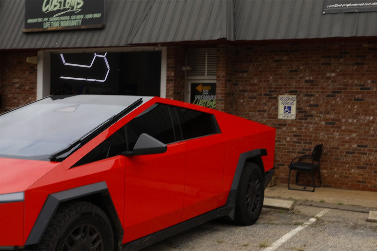 Tesla Cybertruck wrapped gloss red