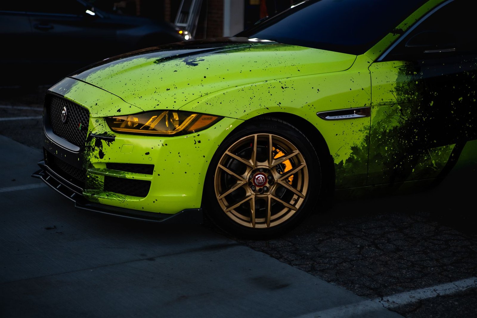 Jaguar wrapped in lime green